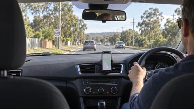 Thematic road scene for Are Speed Camera Detectors Legal in Australia?