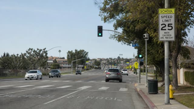 Thematic road scene for Speed Camera Tickets: Cost, Points, Insurance and How to Respond